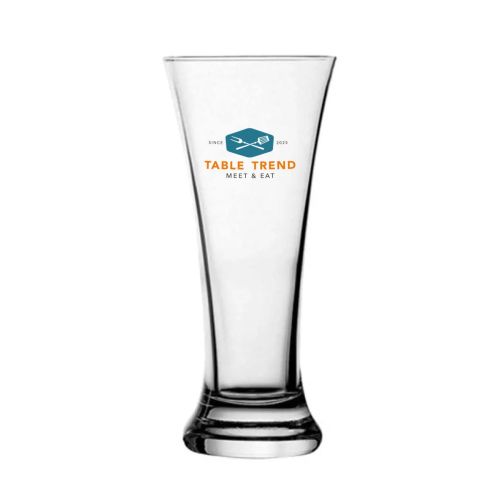 Tuborg bierglas 34 cl. bedrukt met meerkleurig TableTrend-logo op de voorzijde van het glas. Tuborg bierglas 34 cl. bedrukt met meerkleurig TableTrend-logo op de voorzijde van het glas.