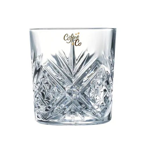 Voorzijde van Broadway Tumbler 30 cl. glas met meerkleurig CoffeeCo-logo op transparant glas. Voorzijde van Broadway Tumbler 30 cl. glas met meerkleurig CoffeeCo-logo op transparant glas.